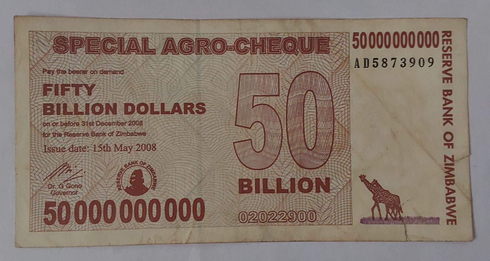 Zimbabwe 50 000 000 000 Dollars (50 Billion) (Special Agro-Cheque)Used note ending serial no:909 - ZealHobbieZ