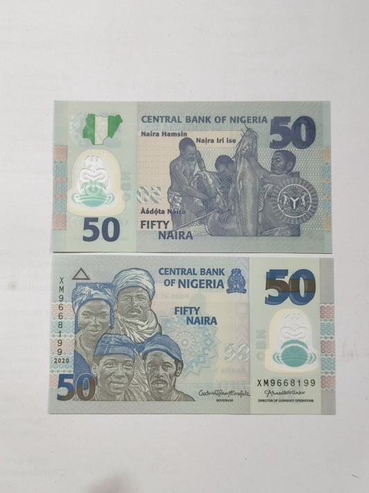 Two fifty-naira notes from Nigeria on a white background